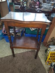 Two Tiered Side Table featuring Turned Wood Legs and a Scalloped Edge Top