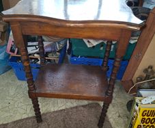 Two Tiered Side Table featuring Turned Wood Legs and a Scalloped Edge Top