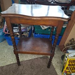 Two Tiered Side Table featuring Turned Wood Legs and a Scalloped Edge Top