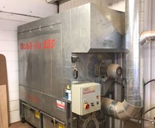 Dust extraction system for woodworking machinery