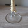 A tall clear glass candle holder Image 3