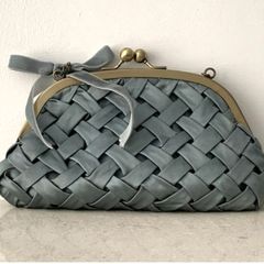 Principles Clutch Bag