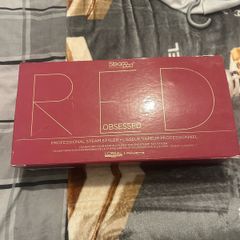 LOreal Professionnel Steampod 2.0 Red Obsessed limited edition hair styling tool.