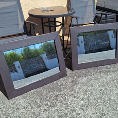 Pair of leather framed mirrors