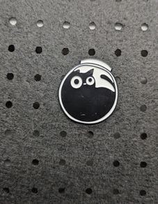 Cat in a bowl enamel pin