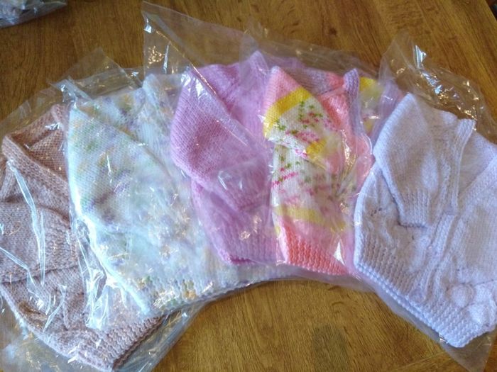 Beautiful hand knitted baby cardigans