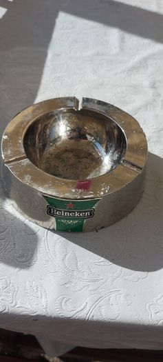 Heineken metal ashtray ,used condition, still nice condition ,buyer collects or pays postage thank you, sold as is,