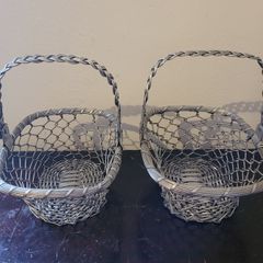 Vintage pair of stainless steel woven baskets