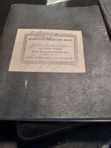 two hand written books