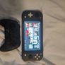 Nintendo switch + controller+20 games installed on it Image 8