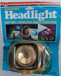 vintage new unopened  adjustable headlight