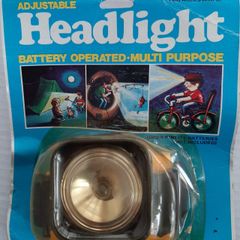 vintage new unopened  adjustable headlight
