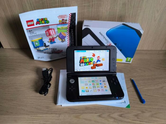 Nintendo 3DS XL boxed with 20 games