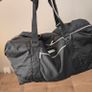 Large black expandable travel bag with shoulder strap Image 6