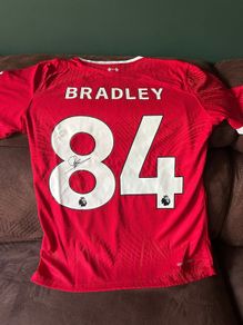 Conor Bradley signed Liverpool jersey