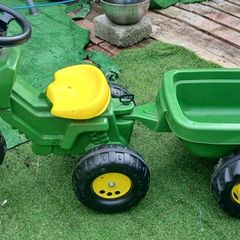 John Deere kids pedal tractor and trailer.