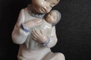 Liadro by Nao Girl with Doll