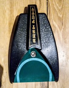 Putting machine