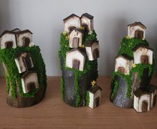 Handcrafted wooden houses on logs!