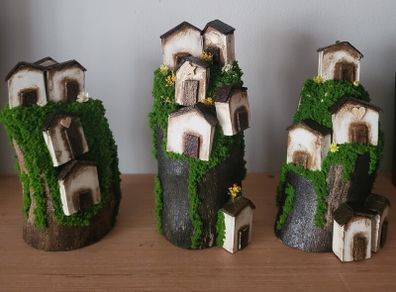 Handcrafted wooden houses on logs!