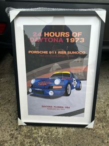 Motor racing themed posters. 50cmX70cm. Framed.