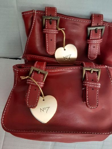New leather make up bag tag attached