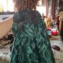 Vintage Large Victorian-style collectible Porcelain Doll featuring curly reddish-brown hair and a multi-layered emerald green satin and lace dress Image 6
