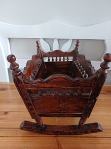 Wooden baby doll crib
