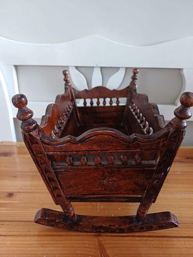 Wooden baby doll crib