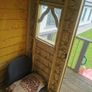 Playhouse with slide and swings Image 8