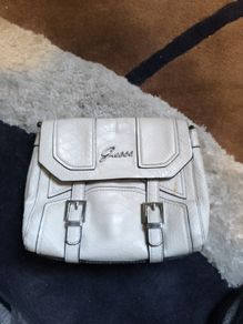 small guess clutch bag cream colour