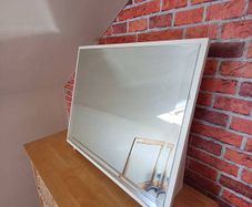 Wooden surround mirror.   Free standing