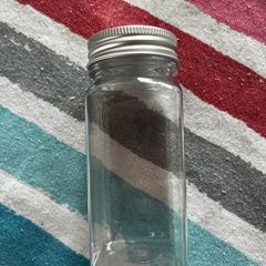 24 spice jars with labels