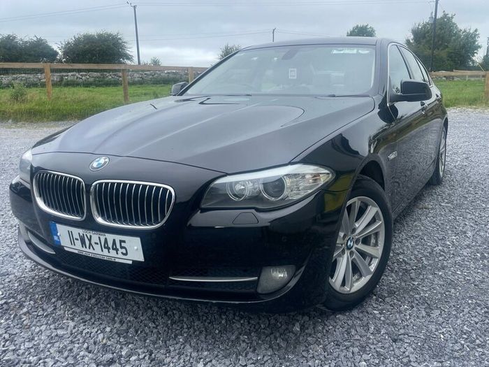 BMW 5 series, black with cream leather interior