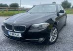 BMW 5 series, black with cream leather interior