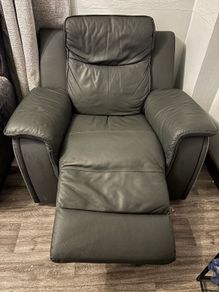 Grey leather recliner armchair