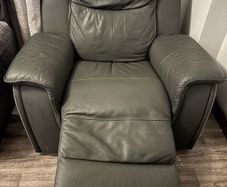 Grey leather recliner armchair