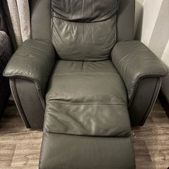 Grey leather recliner armchair