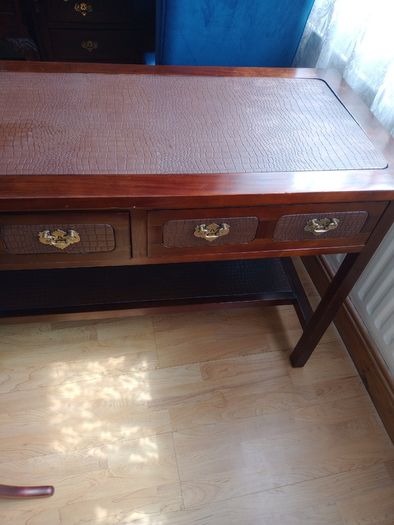Wooden console table with faux crocodile skin detail