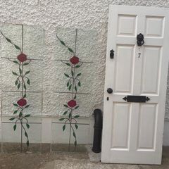 Period Style Door with Lion Head Knocker and Decorative Glass Panels