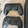 Sony PlayStation 4 console with two controllers and three games Image 3