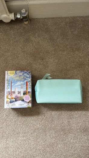 Brand new makeup bag and four brand new products