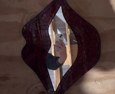 Mosaic lip shaped mirror
