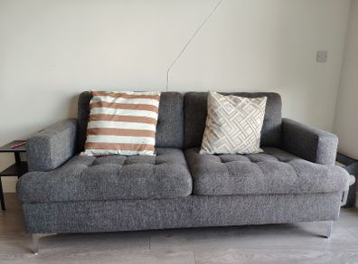 Grey fabric sofa and glass top dining table set