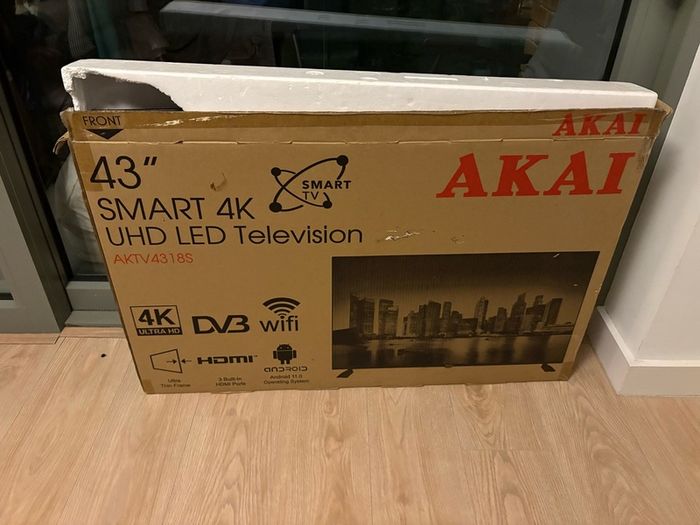 Tv with no remote (button can be used) and no stand.. Box included