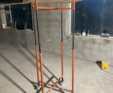 Height adjustable plastering stands