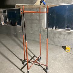 Height adjustable plastering stands