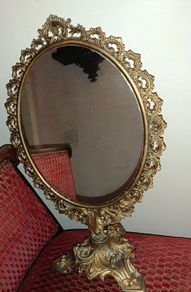 Tall Art Nouveau brass standing mirror