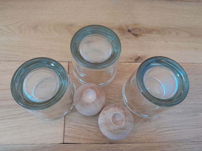 3 glasses and 2 wooden diffuser balls