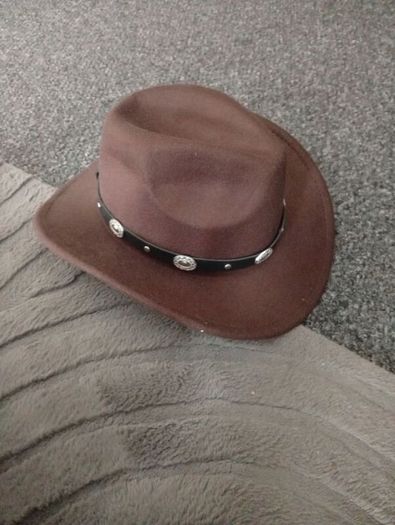 Cowboy Hats/ Brown and white and a light brown for sale .